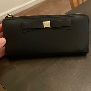 Kate Spade black leather zip around wallet with bow and pink interior